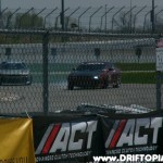 The cars in action.
