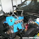 s13rebuild133 Reinstalling the ca18det into the s13's engine bay.