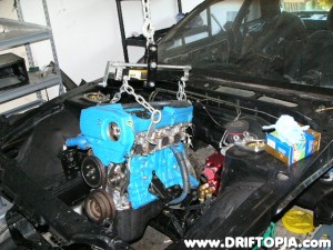 Reinstalling the ca18det into the s13's engine bay.