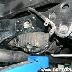 Place the differential back in position using the hydraulic jack.  Connect everything back together in the reverse order that it was removed.