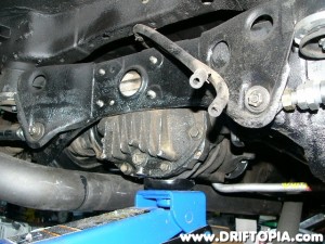 Place the differential back in position using the hydraulic jack.  Connect everything back together in the reverse order that it was removed.