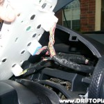 psremoval35 Once disconnected, pull the cluster away from the dash and remove the three plugs to the cluster by depressing the tabs on the top of each plug.