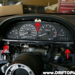 Disconnect the gauge cluster at the three highlighted points.
