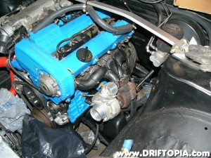 A T25 temporarily installed.  I am going to rotate the flange slightly to angle the exhaust towards the transmission to allow for very secure bracing.  This will also enable a very direct cold air intake.