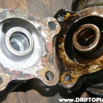 The CA18DET oil filter mount (clean) shares the same bolt pattern as the inline cooler mount pulled from salvage. (dirty)