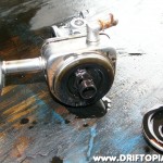 Unscrew the top of the cooling portion to clean the inside.