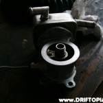 Using a 3/8" to 1/8" adapter, my oil temperatue probe sits snuggly in the side of the housing.