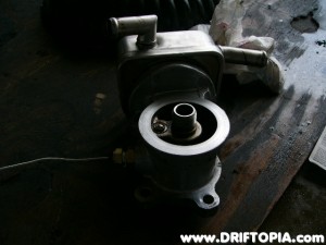 Using a 3/8" to 1/8" adapter, my oil temperatue probe sits snuggly in the side of the housing.