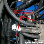 Use the small nipple to route a vacuum line for the fuel pressure regulator.