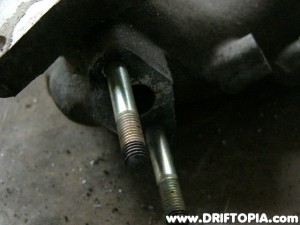 Locate the EGR mount and cut the two bolts off.