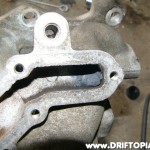 ca18detottpulsarmanifold222 Flip the manifold around and pack JB Weld on the other side of the EGR feed.