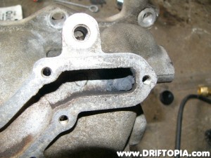 Flip the manifold around and pack JB Weld on the other side of the EGR feed.