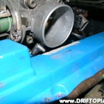ca18detottpulsarmanifold26 Test fit the manifold and valve cover to make sure you have removed enough material. Then remove the cover 1 more time for additional modification.