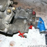 These coolant passages and coolant sensor are not necessary if you retain the CA18DET lower manifold.