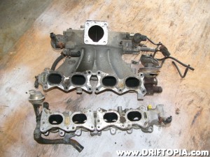 The Nissan Pulsar over the top intake manifold.
