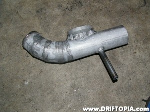 The completed charge pipe for the new setup.  I created a smooth transition and added the BOV flange and idle air nipple.