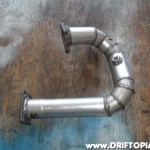 The new down pipe that will route the exhaust out the passenger front side of the 240.