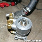 The adapter is then secured to the mount with the center stud as shown.  This is an extension that will come with the adapter.