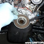 ca18dettimingbelth This washer will slide off, revealing the lower sprocket.
