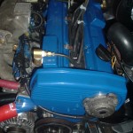 The valve covers, front engine cover and thermostat housing have been powder coated bengal blue.
