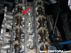The offender is the cam cap bolt.  These snap very easily as they are only supposed to see 8.5 ft-lbs torque.  This is how I learned my torque wrench was out of spec.