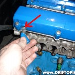 day26i Removing the original return from the intake side valve cover.