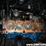 day26j My head gasket was still in great shape so I reused it by spraying it with copper gasket spray.