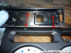 At this point, starting with a small drill bit, create mounting holes in the ScanGaugeII piece and the dash panel.  (NOTE: These holes were created through both pieces at the same time to ensure that the holes remain aligned.  The image above was taken afterwards to show how the holes should correspond.)