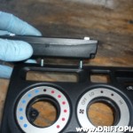 This image shows the general idea behind mounting the gauge.  Small bolts will be placed through the back of the ScanGaugeII panel and then through the dash panel.