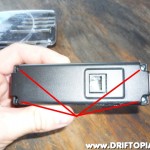 Flip the ScanGaugeII over and remove the 4 screws that hold the housing together.