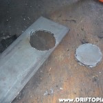 The first circle cut out of the plate.