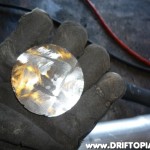 Grind all surfaces of the two circles to expose fresh metal.