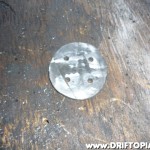 Drill three small concentric pilot holes into the bottom circle.