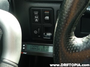 The scangaugeII has been temporarily installed on the lower left side of the dash.  I have it configured to display coolant and intake air temp as well as MPG and volts.