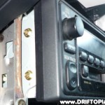 Side view of the factory head unit during removal.