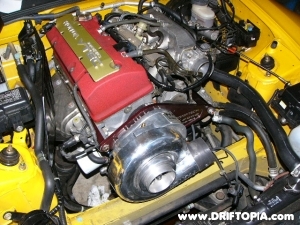 The comptech supercharger installed on the honda s2000 The comptech supercharger installed on the honda s2000