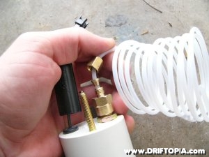 Jpg image showing the nylon boost line connecting to the back of the Faze boost gauge on the Honda S2000. Jpg image showing the nylon boost line connecting to the back of the Faze boost gauge on the Honda S2000.