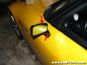 Tighten the mirrors in place at these two points.