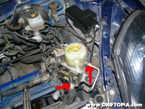 Remove the two power steering lines from the pump