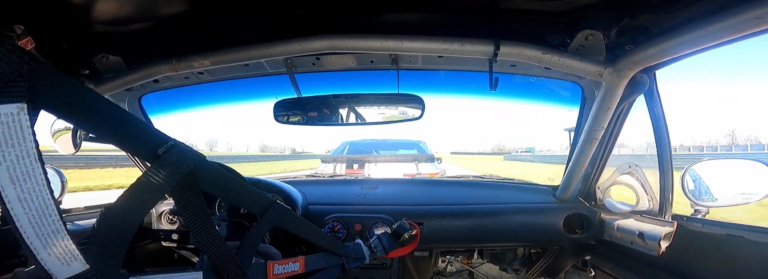 Bump drafting the 944 Spec in the Spec Miata at NCM.