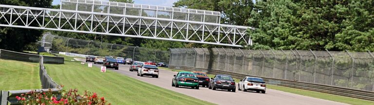The 944 Spec, Spec Miata, and ST6 fields bunched up at the start.
