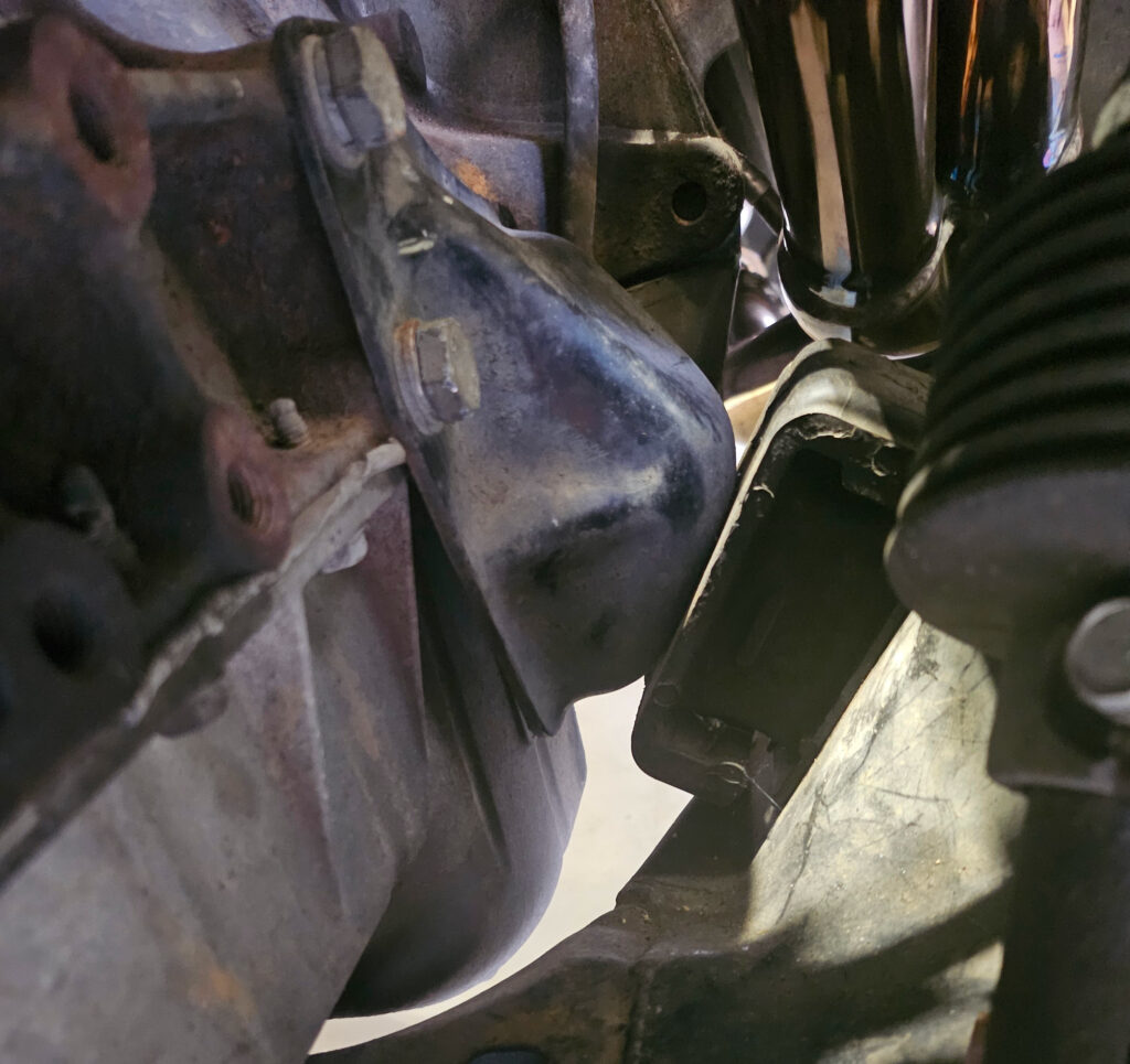 Upper engine mount bracket on the NA6 Miata that connects the engine block to the engine mount.