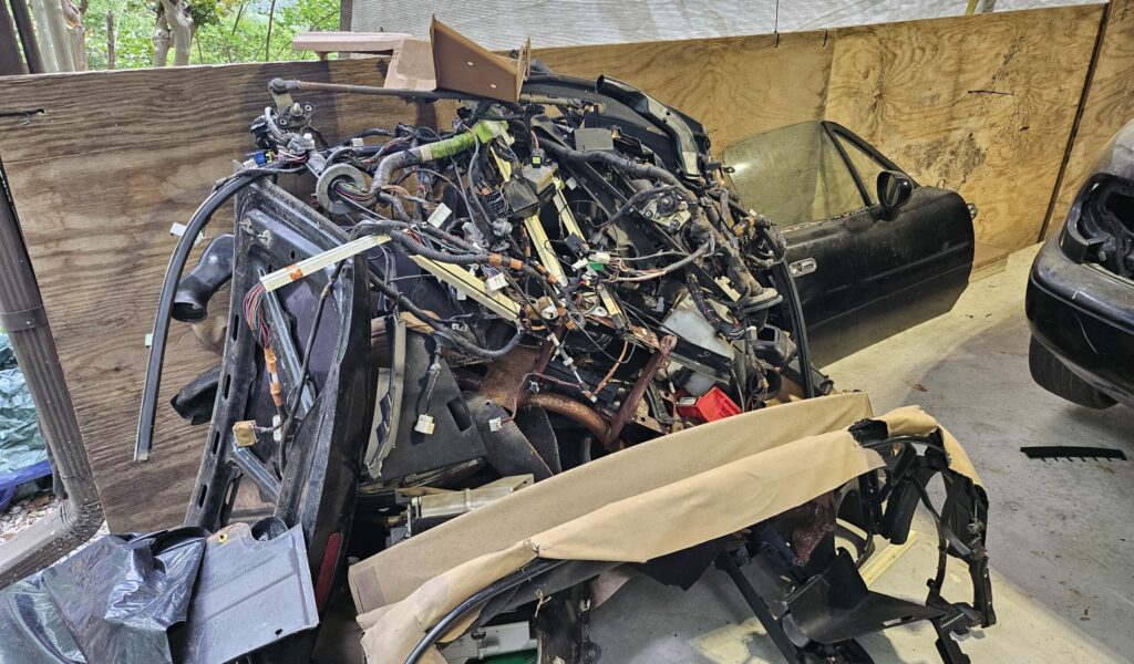 Pile of parts removed from the NA Miata.