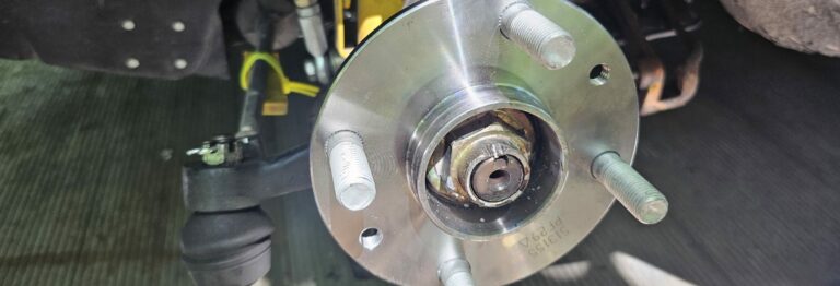 The new front hub assembly was installed on the NA Miata MX-5.