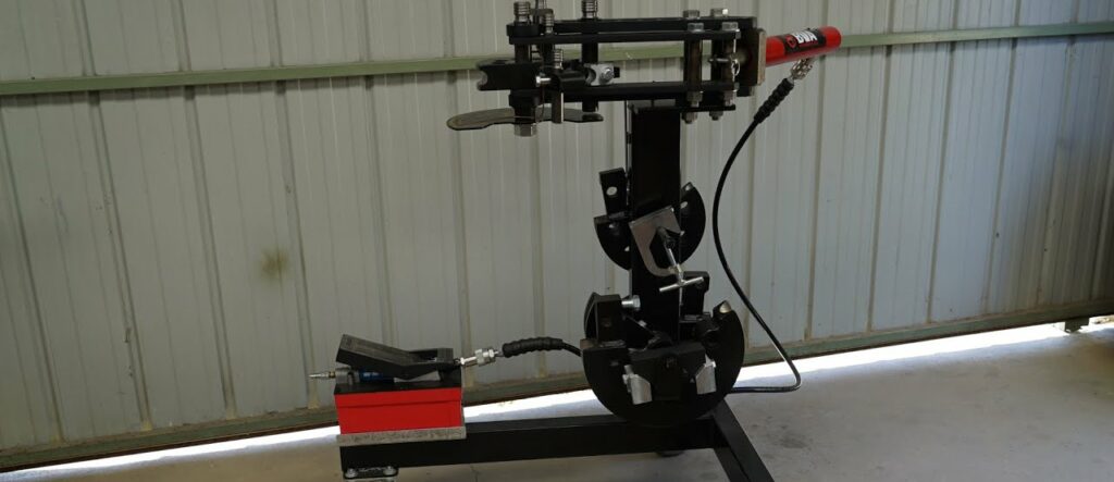 Engine stand used as tube bender mount.