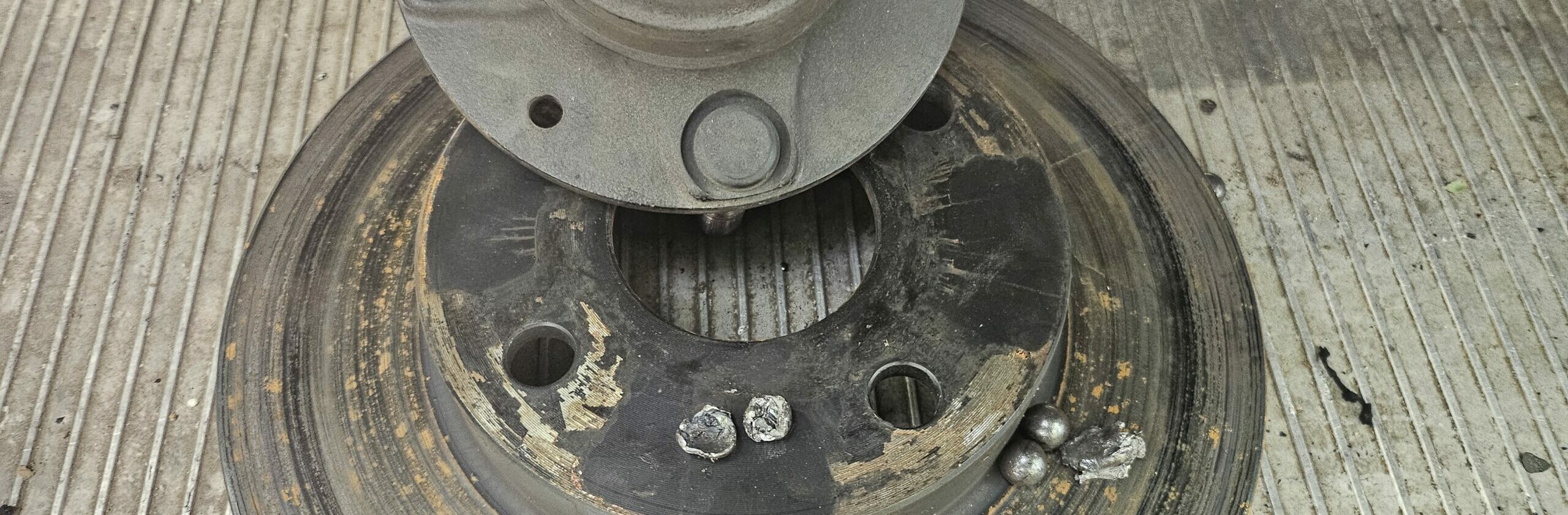 Crushed ball bearings from the NA Miata racecar wheel bearing.