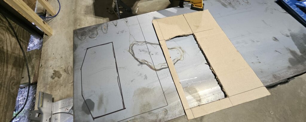 Cardboard template used to approximate the rear roll cage mounting plate on the exo car 'ghettocet' miata.