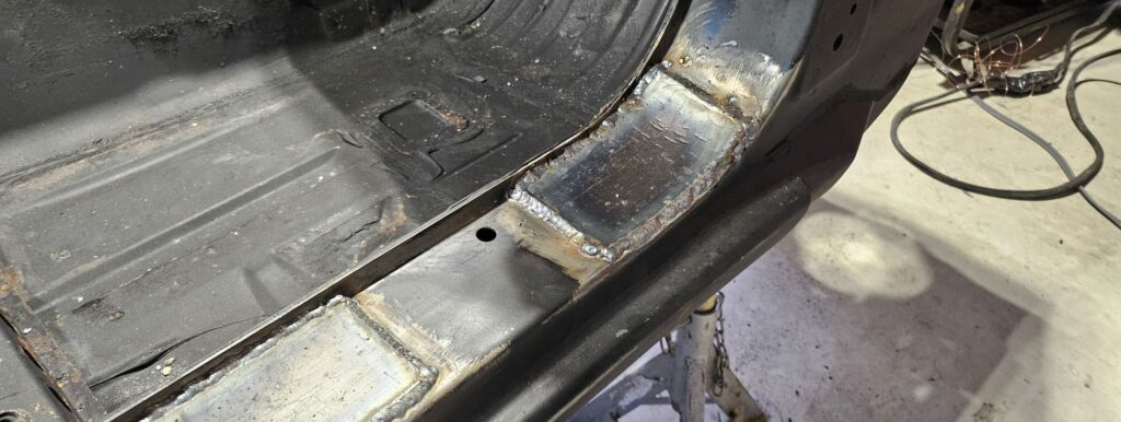 The forward a-pillar bar mount plate on the exo car 'ghettocet' miata.