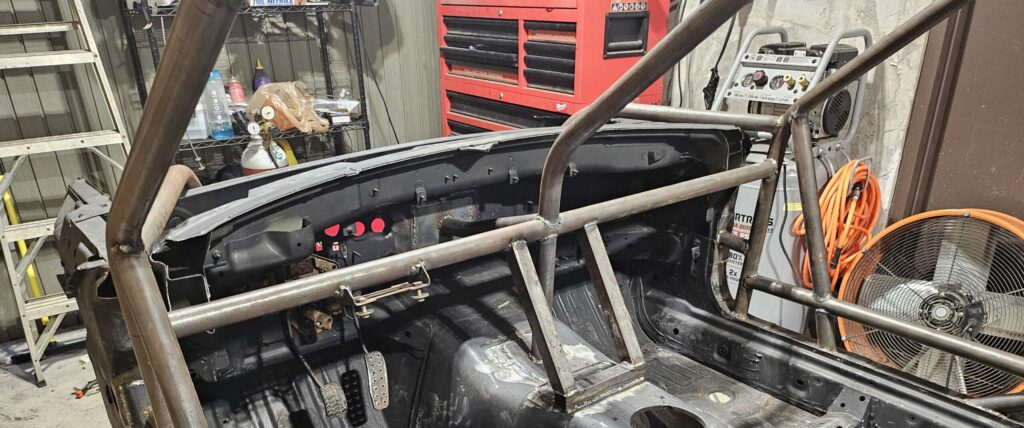 The third vertical A-pillar bar will help support the Lexan windscreen on the ghettocet miata.