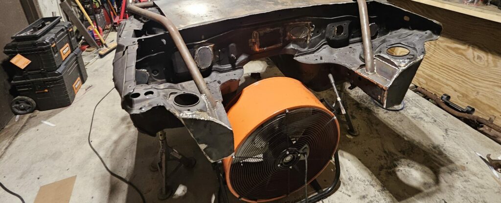 The reinforced and boxed strut tower mounts on the 'ghettocet' miata.